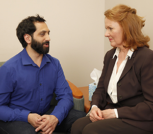 Man talking to mental health professional.